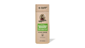 Shampoo bottle with a green label on a green background